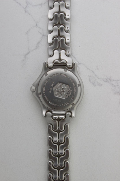 Case back of the Tag Heuer Professional S/EL Ref. S99.206, featuring an engraved Tag Heuer logo, water resistance rating of 200M, and Swiss-made stainless steel construction. Includes sapphire crystal and original bracelet. A rare and collectible vintage timepiece.